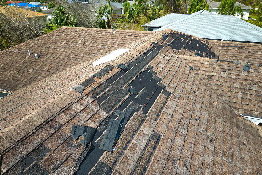 Missing shingles after wind storm damage